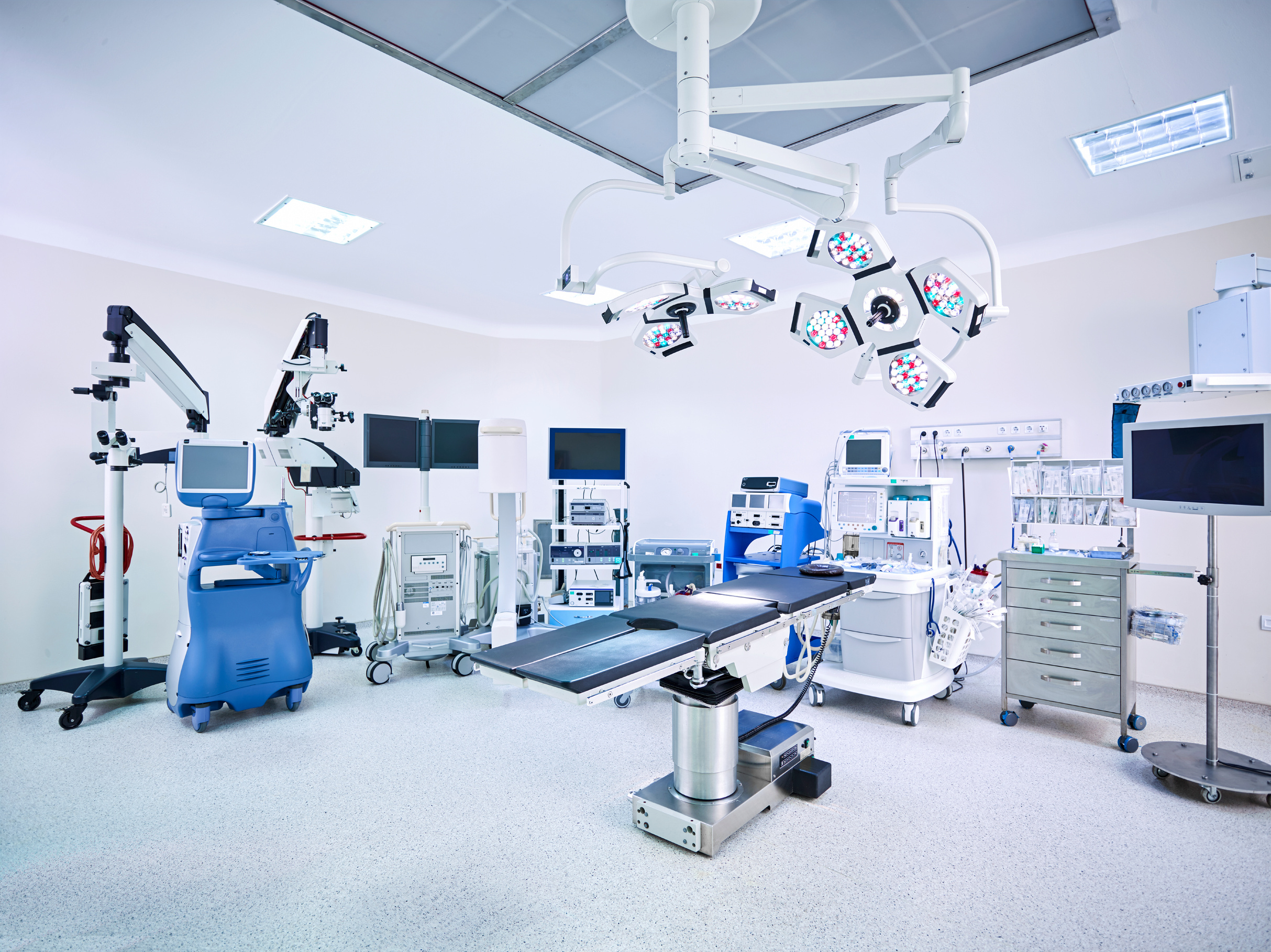 Modern hospital operating room with monitors and equipment